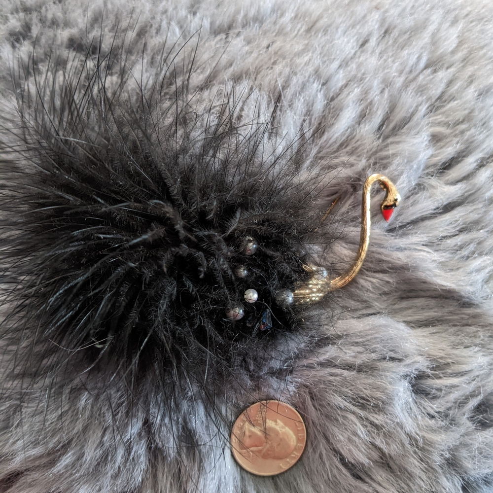 Elegant Gold Swan Brooch with Black Feathers - Picture 2 of 6